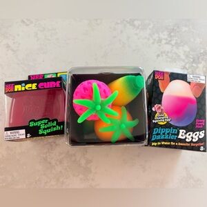 Needoh trio. Pink nice cube, groovy fruit, and dippin dazzlin egg!